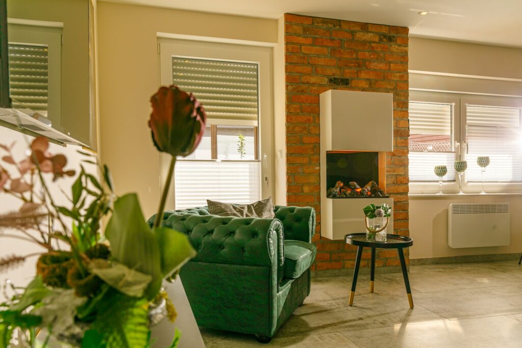 Ferienhaus Andrea - Wohnzimmer mit Kamin