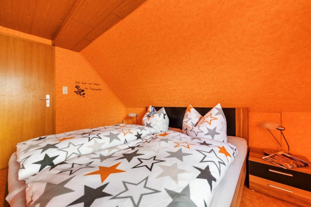 Ferienwohnung Andrea - Schlafzimmer gemütliches Doppelbett